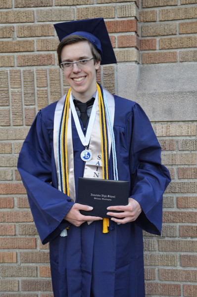 Bruce with diploma